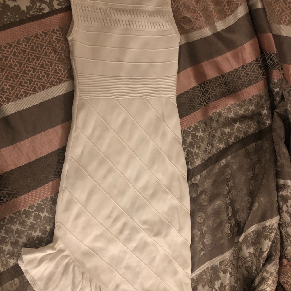 White knit sweater dress with ruffle hemline